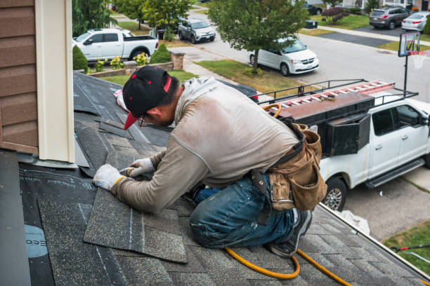 Professional Roof Replacement technician working in Burt, MI